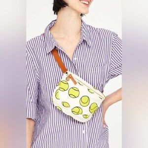 CLARE V FANNY PACK IN NATURAL CANVAS W/ TENNIS BALLS.